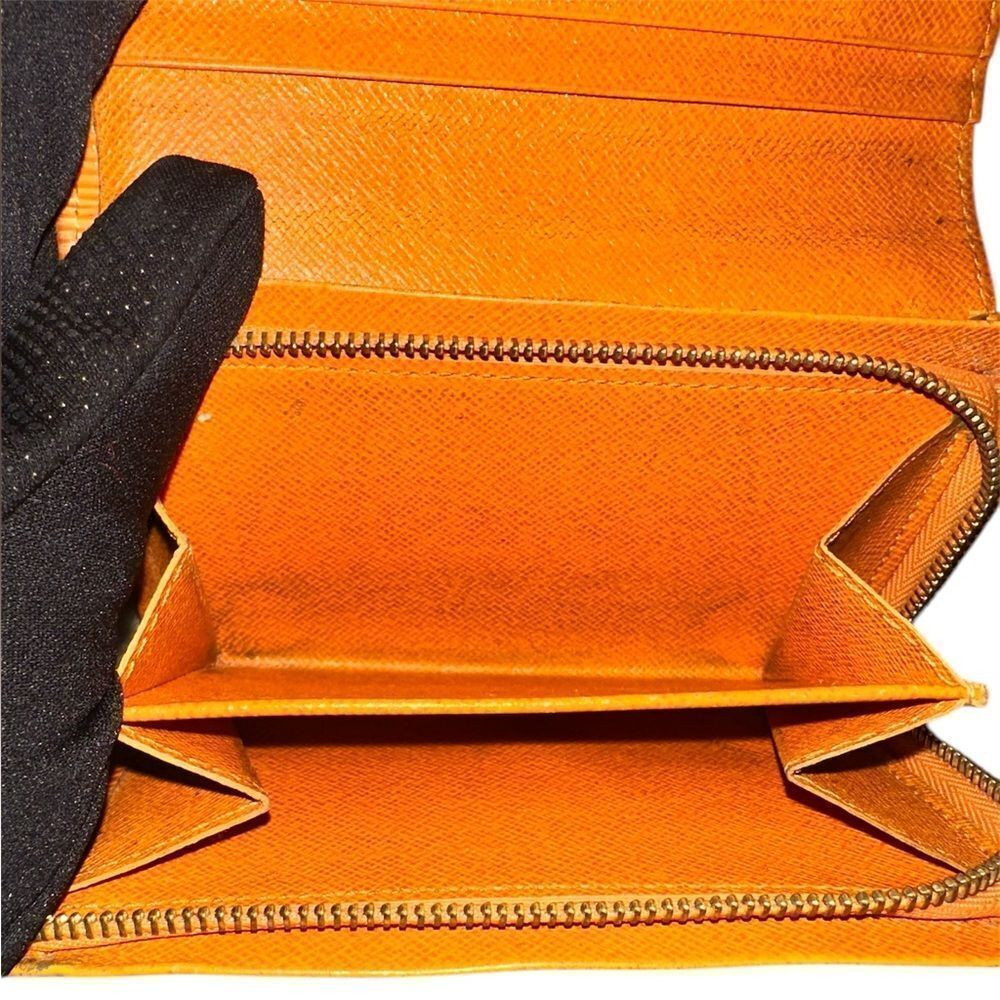 Authentic Louis Vuitton epi leather snap wallet. Orange. - Picture 13 of 16